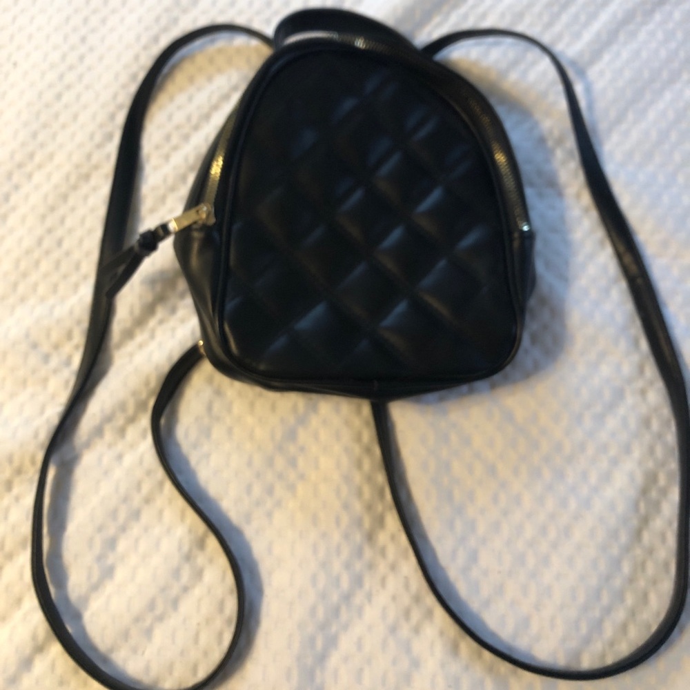 Mini black and gold backpack